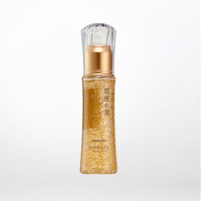 Hakuza Beauty Essence bottle showing elegant platinum gold leaf flakes suspended in clear serum