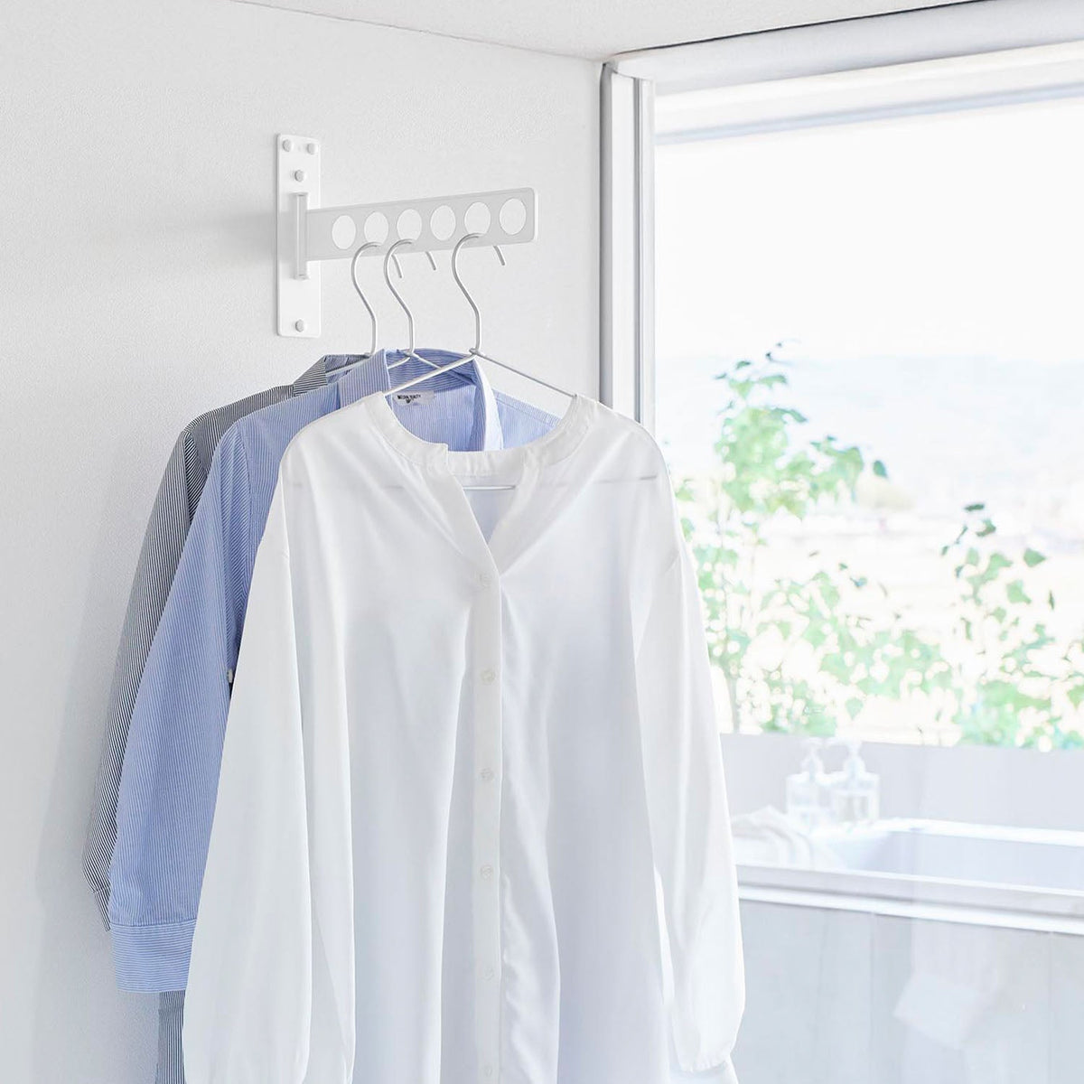 Yamazaki Tower Wall-Mounted Folding Clothes Hanger, 6 Slots, Wall Plate with a Swing-Out Six-Slot Arm for Drying Clothes Indoors that Folds Flat to 1.5 cm, 30 x 1.5 x 18 cm; in use 5 to 30 x 1.5 to 28.4 x 18 cm and 330 g, White or Black
