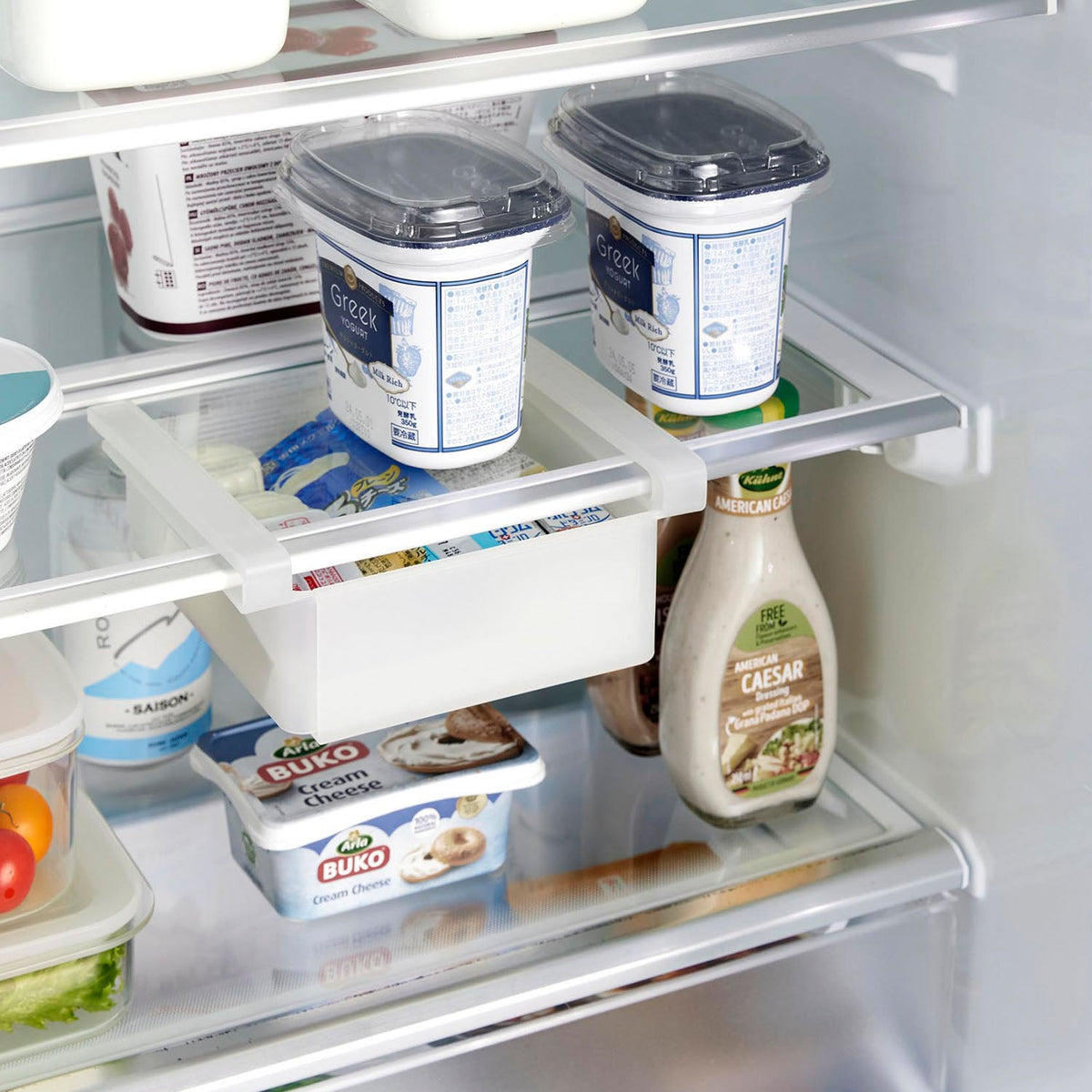 Yamazaki Tower Extendable Fridge Under-Shelf Rack, Rack That Clips Under a Fridge Shelf and Extends Between 18.3 and 26.7 cm Wide to Hold Ham, Cheese and Other Packs, Holds 1 kg, 18.3 to 26.7 x 17.6 x 7.6 cm and 234 g, White or Black