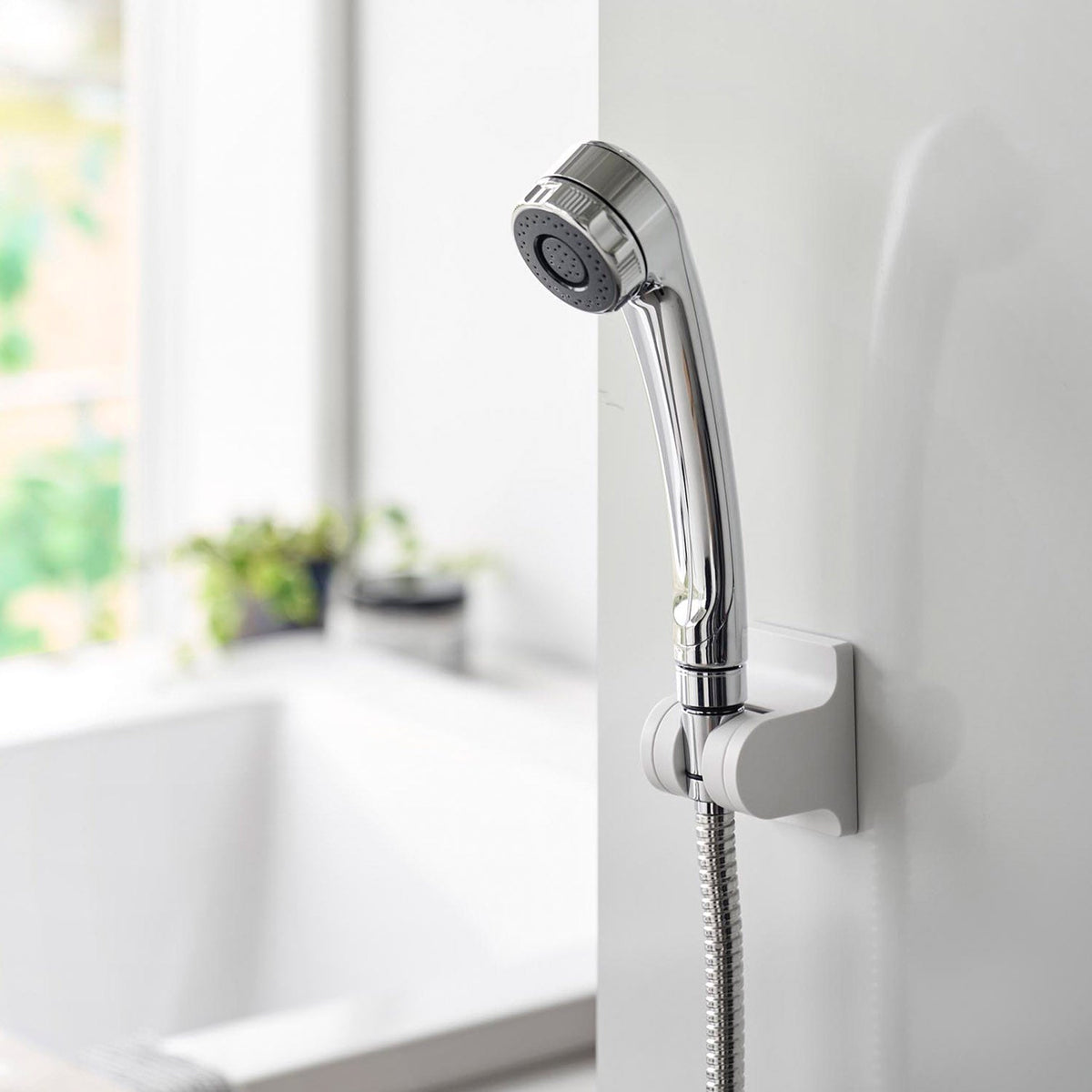 Yamazaki Tower Film-Hook Adjustable-Angle Shower Holder, Film-Hook Shower Holder with an Adjustable Angle that Sticks to Tile and Glossy Walls, Three Angle Steps of 10 Degrees, Fits Hoses up to 1.8 cm Across, 5.5 x 5.8 x 7 cm and 60 g, White or Black