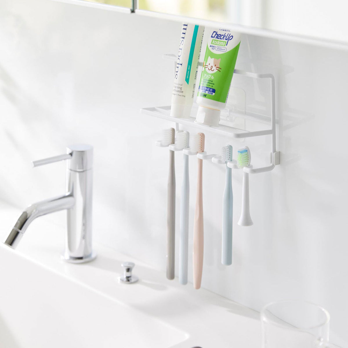 Yamazaki Tower Film-Hook Toothbrush and Tube Holder, Film-Hook Holder that Floats Toothbrushes and Tubes off the Basin, Six Brush Slots and a Tube Shelf, Sticks to Tile and Glossy Walls, 16 x 6.4 x 10.8 cm and 150 g, White or Black