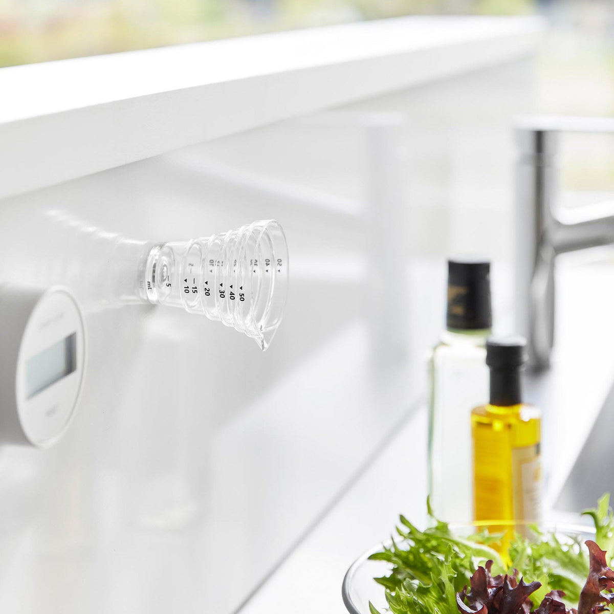 Yamazaki Tower Magnetic Stepped Measuring Cup 50 mL, Small Stepped Measuring Cup with a Base Magnet that Sticks to a Steel Panel, Reads 10 mL Steps to 50 mL and Spoons, 6.2 x 5.6 x 6 cm and 20 g, White or Black
