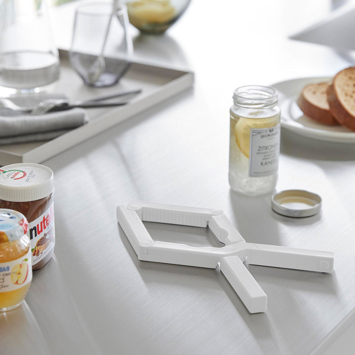 Yamazaki Tower Easy-Grip Magnetic Cap Opener, Long-Handled Cap Opener with Two Grip Sizes for Bottle and Jar Lids up to 7 cm Across, Sticks to a Steel Surface, 27.8 x 3.5 x 1.6 cm and 170 g, White or Black