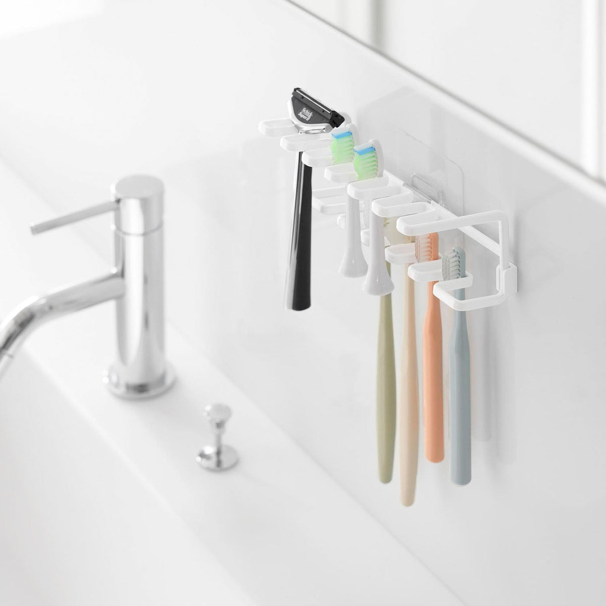 Yamazaki Tower Film-Hook Two-Tier Toothbrush and Spare Brush Holder, Two-Tier Holder on a Film Hook That Floats up to 11 Toothbrushes and Spares on a Bathroom Wall, Slanted Up So They Do Not Slide Off, 14.6 x 6.3 x 6.2 cm and 280 g, White or Black