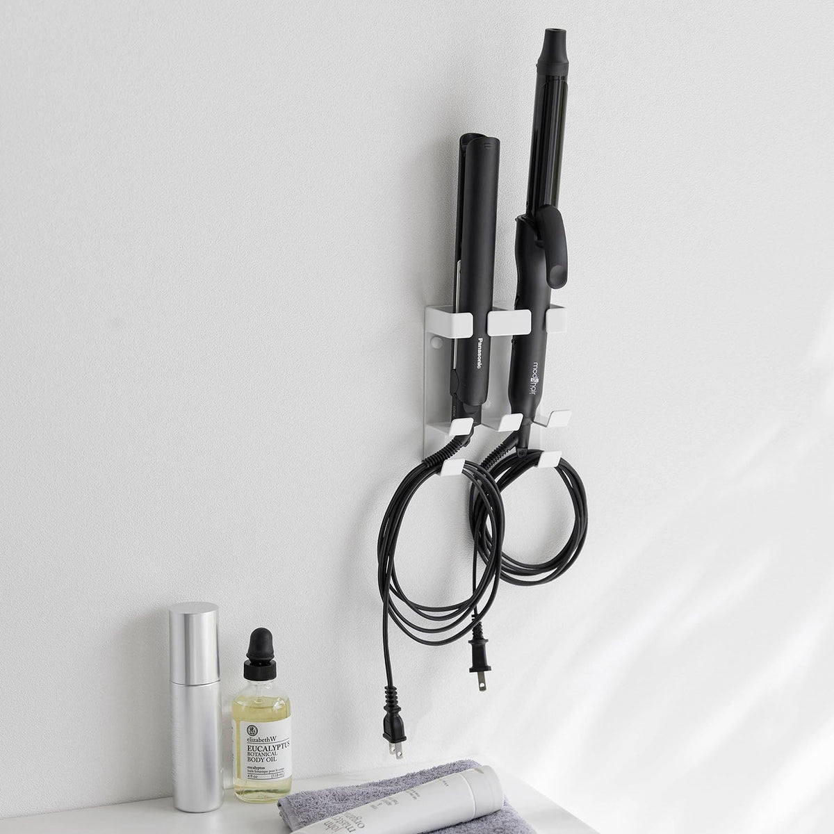 Yamazaki Tower Wall-Mounted Double Hair Iron Holder, Wall Holder With Two Slots for a Straight Iron and a Curling Iron, Cord Slit and Cord Hooks, Holds 1 kg Per Slot, 10.8 x 6 x 13.7 cm and 280 g, White or Black