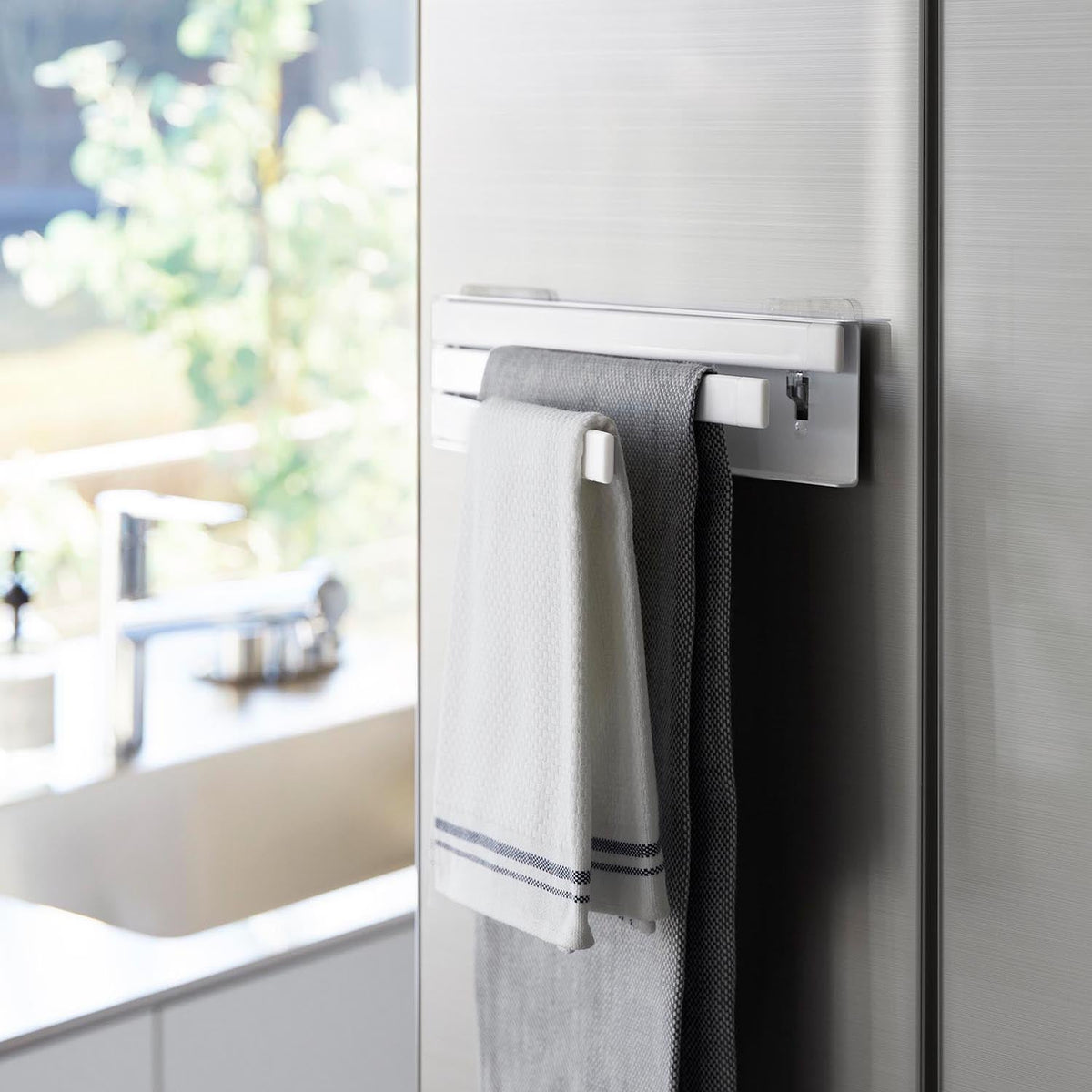 Yamazaki Tower Film-Hook Dishcloth Hanger, Three-Hanger Rack That Sticks to a Kitchen Panel, Tile or Glass Refrigerator Door by Film Hook, Holds 250 g per hanger, 24.5 x 25 x 6 cm open; 24.5 x 1.5 x 6 cm stored and 235 g, White or Black