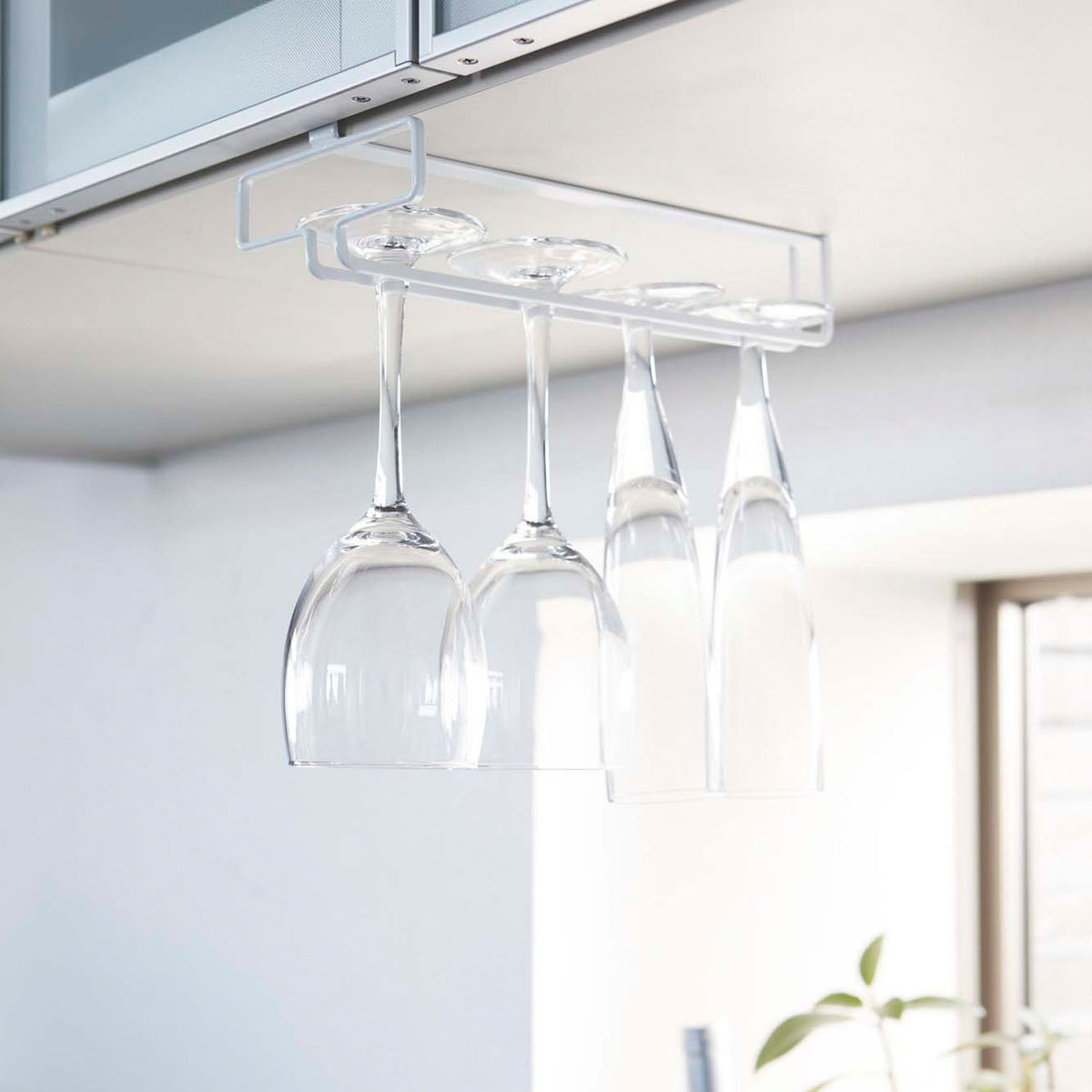 Yamazaki Tower Under-Cabinet Wine Glass Hanger, Rail That Slides Onto the Shelf of a Hanging Cabinet and Hangs One Row Wine or Champagne Glasses by the Stem, Guard Stops Them Falling, Holds 1 kg, 11 x 26 x 7 cm and 220 g, White or Black
