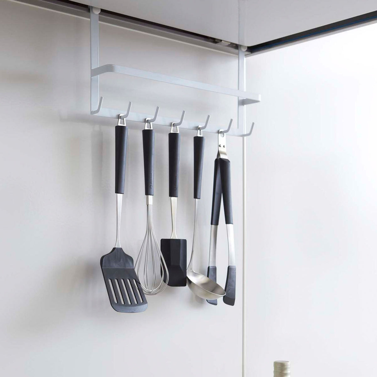 Yamazaki Tower Range Hood Hook, Hook Bar That Hangs on the Lip of a Range Hood and Gives Seven Hooks and a Bar for Kitchen Tools and Cloths, Holds 4 kg, Needs a Hood 34.5 cm Wide or More, 34.5 x 6 x 18 cm and 290 g, White or Black