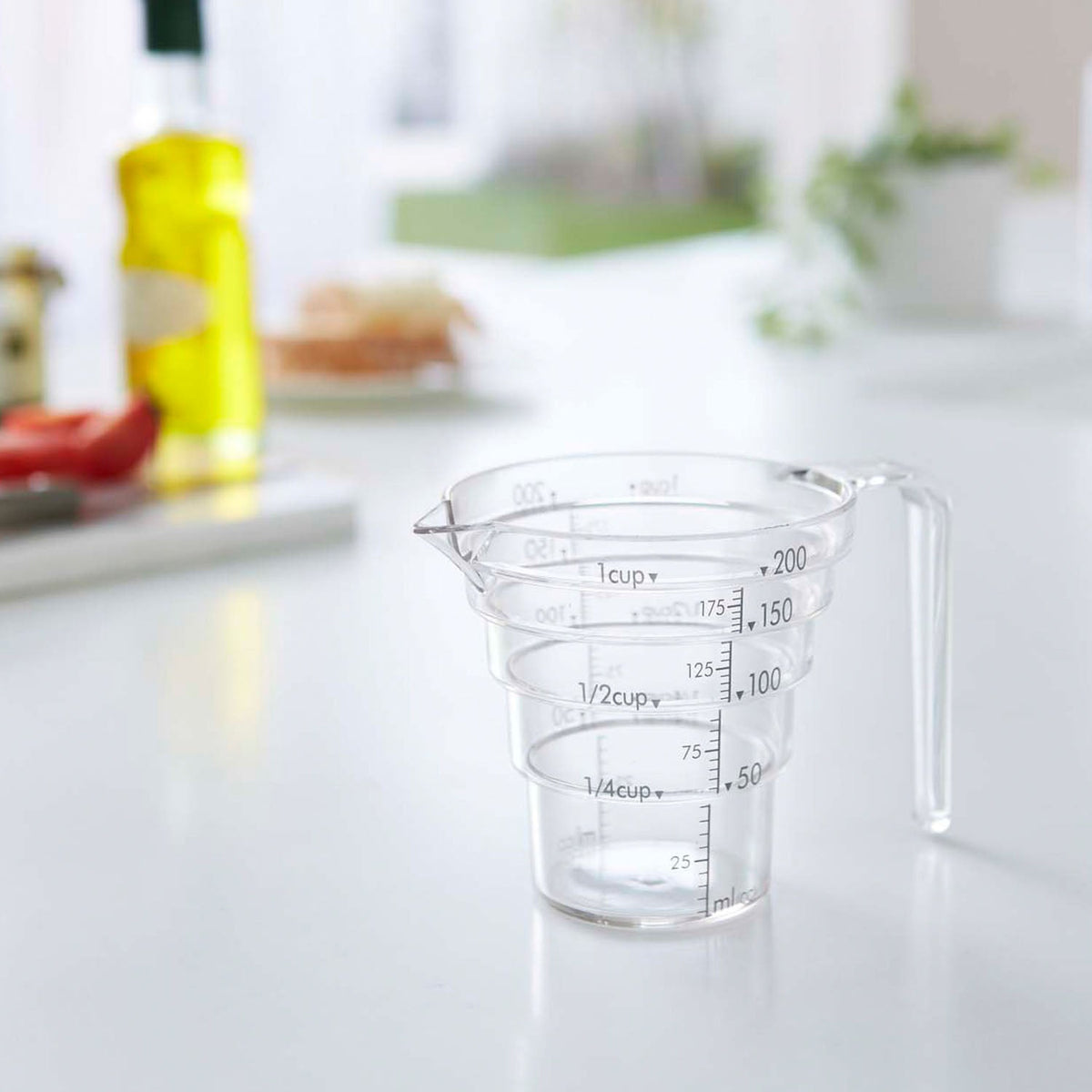 Yamazaki Layer Stepped Measuring Cup 200 mL, Tough Clear Stepped Measuring Cup With a Step Every 50 mL You Can Read From Above, 200 mL Capacity, Microwave and Dishwasher Safe, Heat Safe to 100 C, 12.5 x 8.5 x 8.7 cm and 60 g, Clear