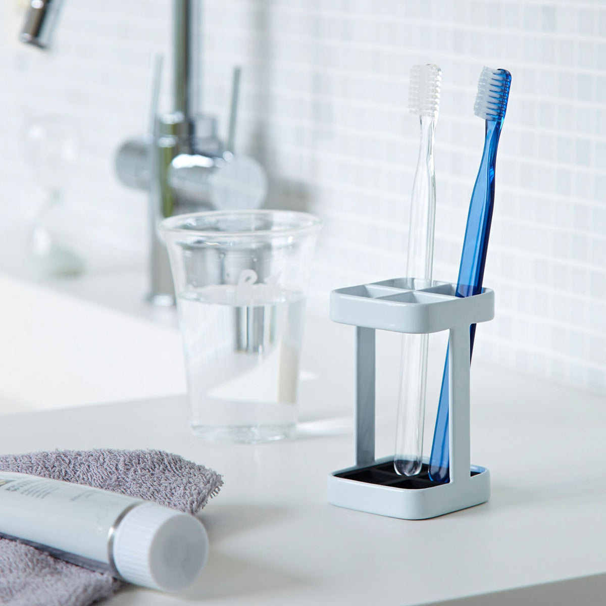 Yamazaki Tower Slim Toothbrush Stand, Tiny Stand That Stores Toothbrushes and Interdental Brushes Slim With Dividers So They Do Not Touch, Removable Silicone Mat Is Easy to Clean, 5.5 cm Square, 5.5 x 5.5 x 9 cm and 145 g, White