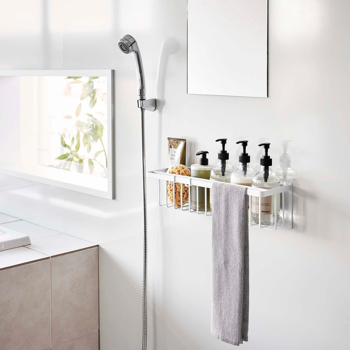 Yamazaki Tower Wide Magnetic Bathroom Basket, Wide Shallow Basket That Sticks to a Steel Bathroom Wall by Strong Magnet and Lines Up Dispenser Bottles and Tubes, Front Bar for Towels, Holds 3 kg, 44.3 x 12.3 x 12 cm and 1450 g, White or Black