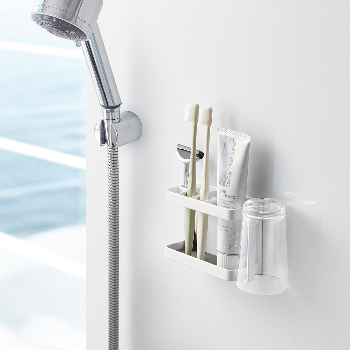 Yamazaki Tower Magnetic Bathroom Toothbrush Stand, Holder That Sticks to a Steel Bathroom Wall by Magnet and Drains Water So Slime Stays Away, Holds 1 kg, 13.5 x 5 x 8.5 cm and 320 g, White or Black
