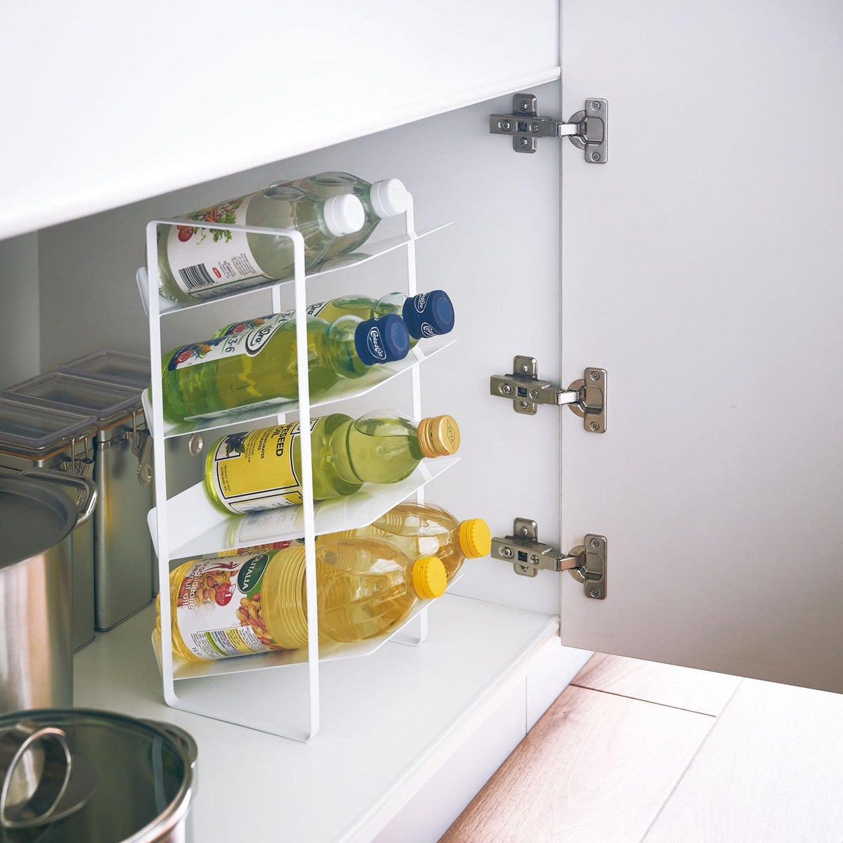 Yamazaki Tower Under-Sink Bottle Stocker 4 Tiers, Slim Four-Tier Stocker With Sloped Shelves That Hold Seasoning Bottles and Oils Neatly and Bring Them Out Easily, Eight 1 L Bottles, Holds 2 kg Per Shelf, 20 x 20.5 x 40 cm and 1800 g, White or Black