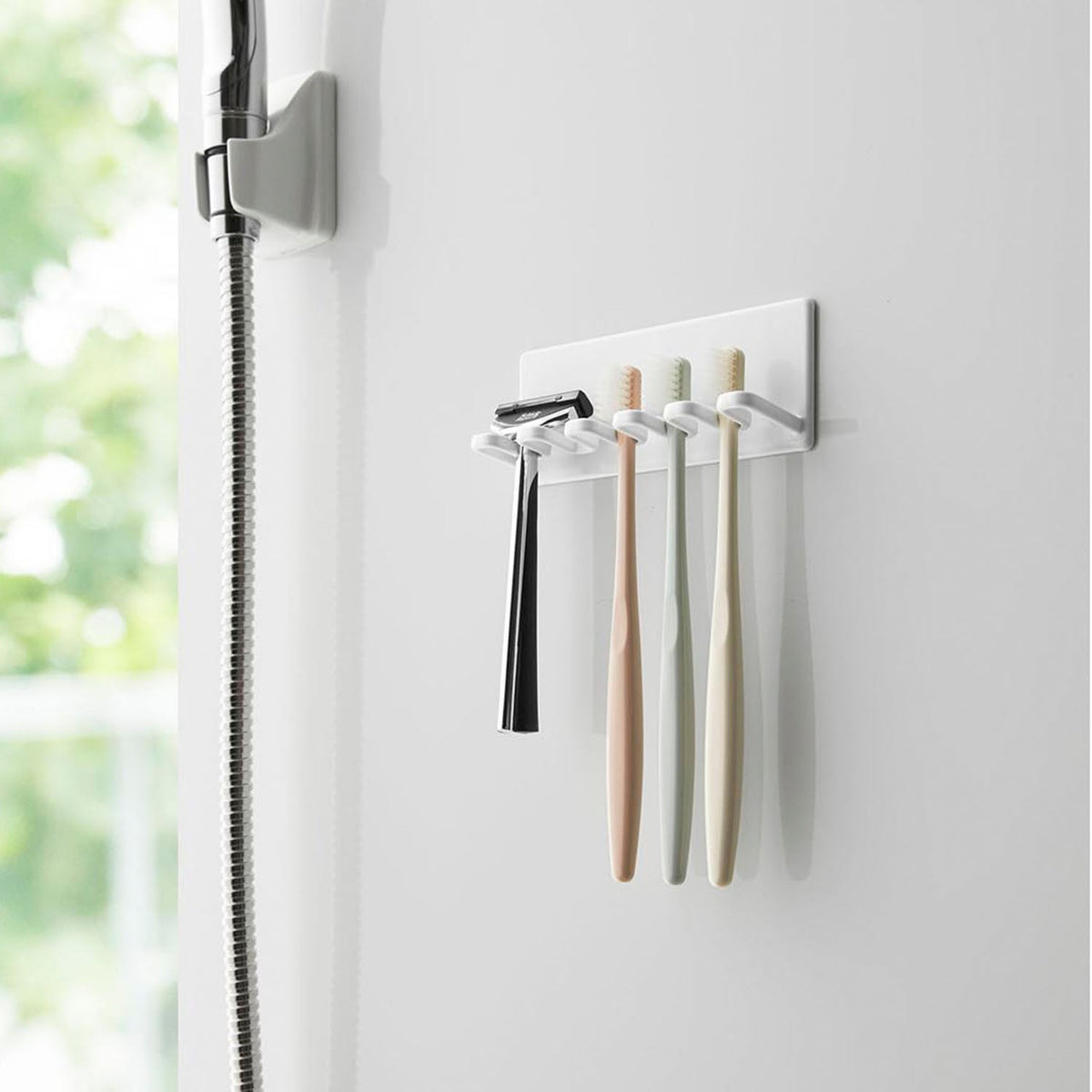 Yamazaki Tower Magnetic Bathroom Toothbrush Holder 5 Slots, Holder That Sticks to a Steel Bathroom Wall by Magnet and Drains Water So Slime Stays Away, Holds 250 g per holder, 13 x 3.5 x 5 cm and 130 g, White or Black