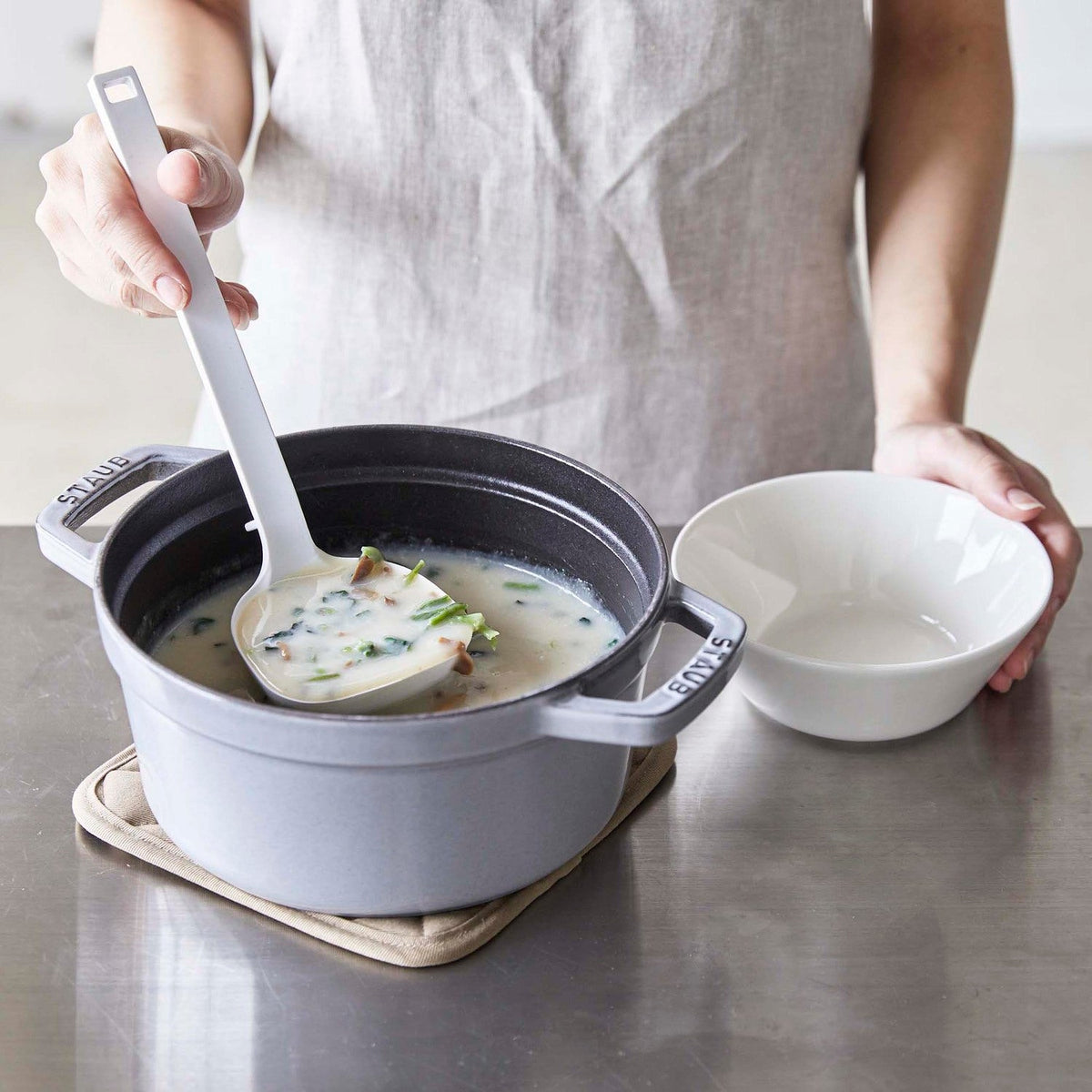 Yamazaki Tower Silicone Ladle, Soft Ladle That Does Not Scratch Pots and Has a Slightly Pointed Corner for Pouring Soups Cleanly, Tip Lifts Off the Counter, Heat Safe to 220 C, Dishwasher Safe, 8 x 6 x 25.5 cm and 60 g, White or Black