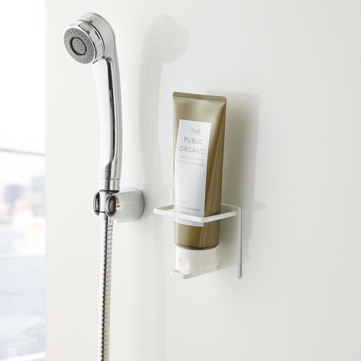 Yamazaki Tower Magnetic Bathroom Tube and Bottle Holder M, Holder That Sticks to a Steel Bathroom Wall by Magnet and Drains Water So Slime Stays Away, Holds 750 g, 8.6 x 6.1 x 8 cm and 135 g, White