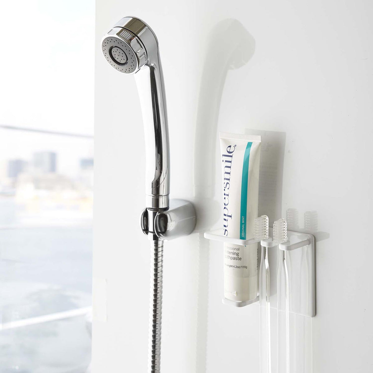 Yamazaki Tower Magnetic Bathroom Tube and Toothbrush Holder, Holder That Sticks to a Steel Bathroom Wall by Magnet and Drains Water So Slime Stays Away, Holds 750 g, 11 x 4.8 x 8 cm and 165 g, White or Black