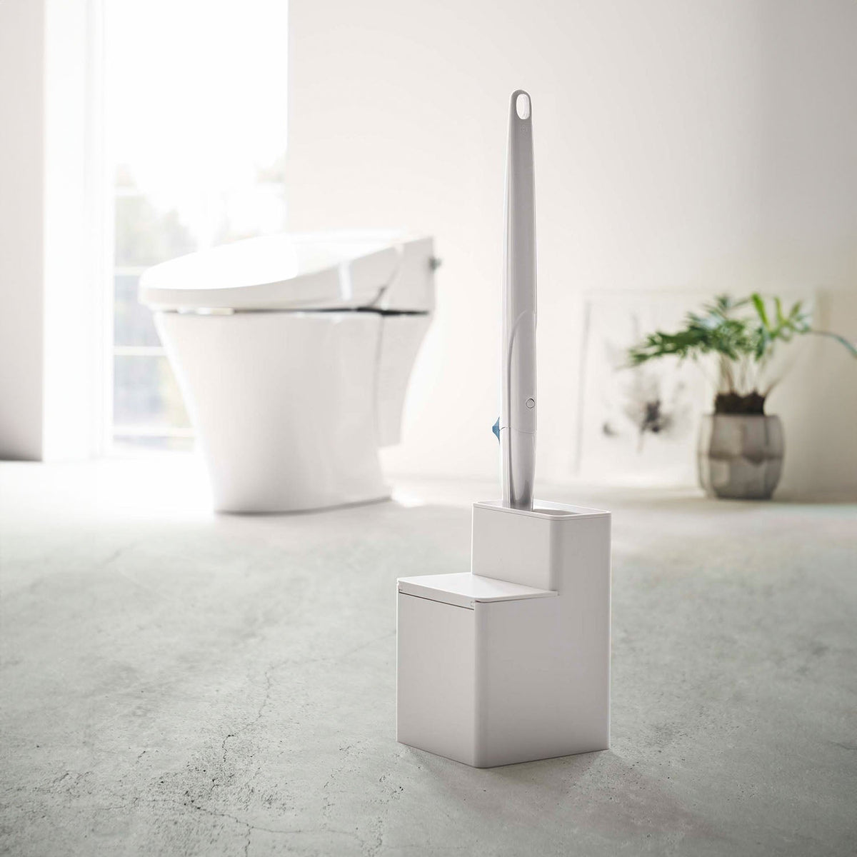 Yamazaki Tower Toilet Brush Stand with Spare Brush Storage, Stand That Holds a Flushable Toilet Brush Handle and About 14 Spare Heads in One Place, Handle-Shaped Slot Fits Snugly, Heat Safe to 90 C, 11 x 12 x 17 cm and 340 g, White or Black