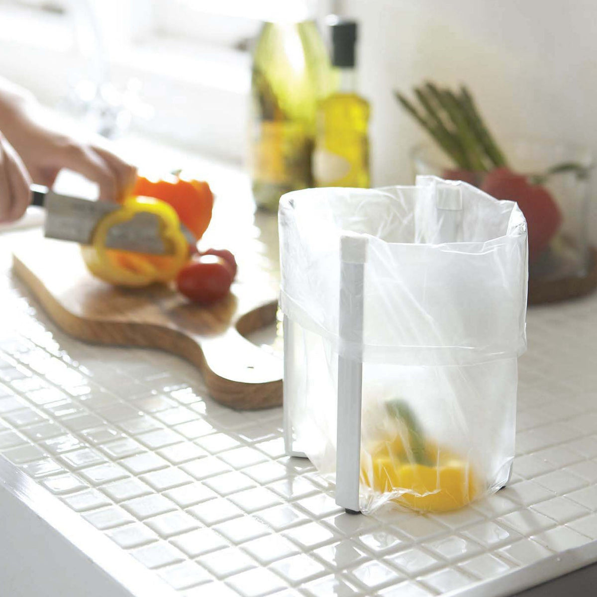 Yamazaki Tower Poly Bag Eco Holder, Small Stand That Holds a Poly Bag for Vegetable Scraps While You Cook, Also Dries Glasses, Flasks and Bottles, Silicone Anti-Slip, 12 x 9.5 x 16.5 cm and 310 g, White or Black