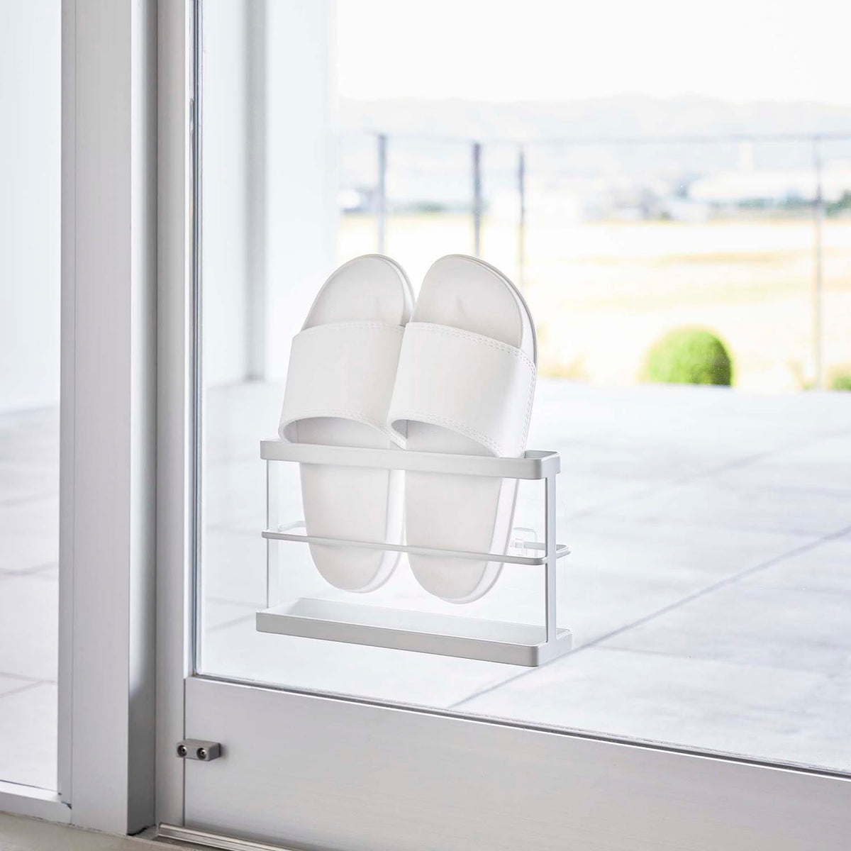 Yamazaki Tower Two-Way Balcony Slipper Rack with Tray, Slim Rack for Balcony Slippers that Sticks to a Window with Film Hooks or Stands on the Floor, 25 x 6.5 x 15 cm without the film hooks and 450 g, White or Black