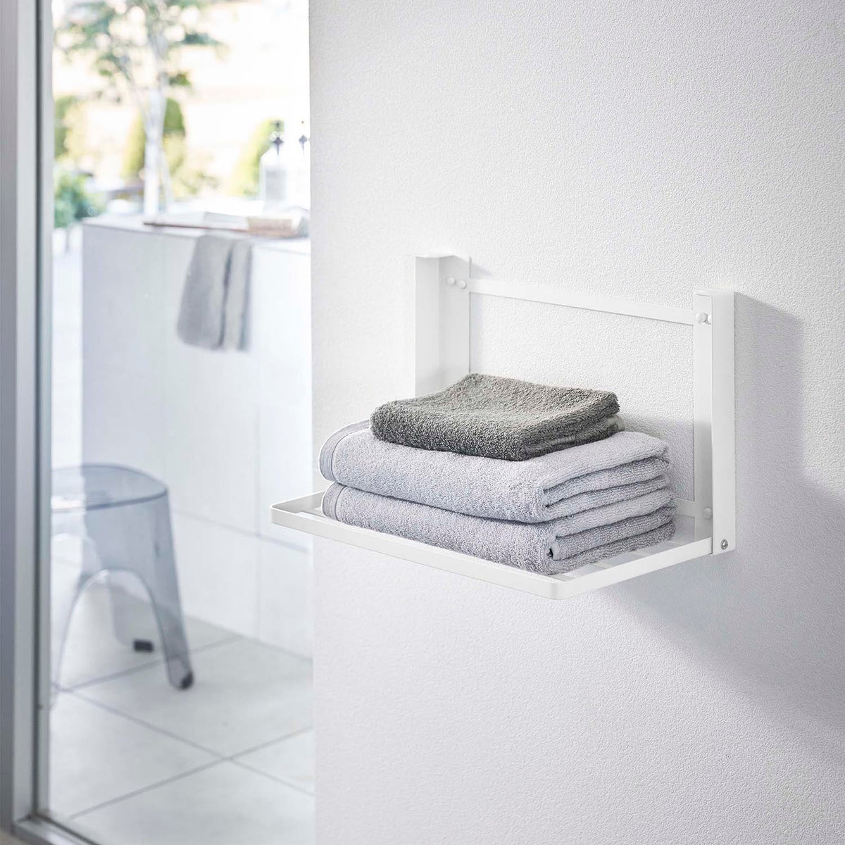 Yamazaki Tower Wall-Mounted Folding Shelf for Plasterboard Walls, Wall Folding Shelf Fixed with Pins or Screws for Towels and Clothes After Bathing, Folds to 4 cm, In use 41 x 26 x 25.5 cm; folded 41 x 4 x 25.5 cm and 1150 g, White or Black