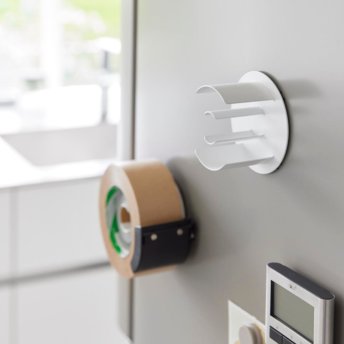 Yamazaki Tower Magnetic Tape Holder, Magnetic Holder for a Large Roll of Packing Tape and a Small Roll of Masking Tape up to 5 cm Wide, Sticks to a Steel Door or Wall, 9.3 x 5.5 x 9.3 cm and 200 g, White or Black