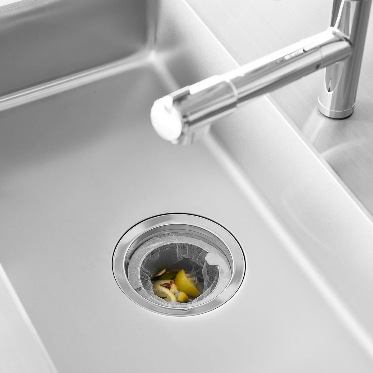 Yamazaki Tower Kitchen Drain Net Holder with Slit, Stainless Steel Holder for a 14.5 cm Kitchen Sink Drain with a Slit that Lets You Squeeze Water from the Net, Dishwasher Safe, 14.4 x 14.4 x 3 cm and 80 g, Silver
