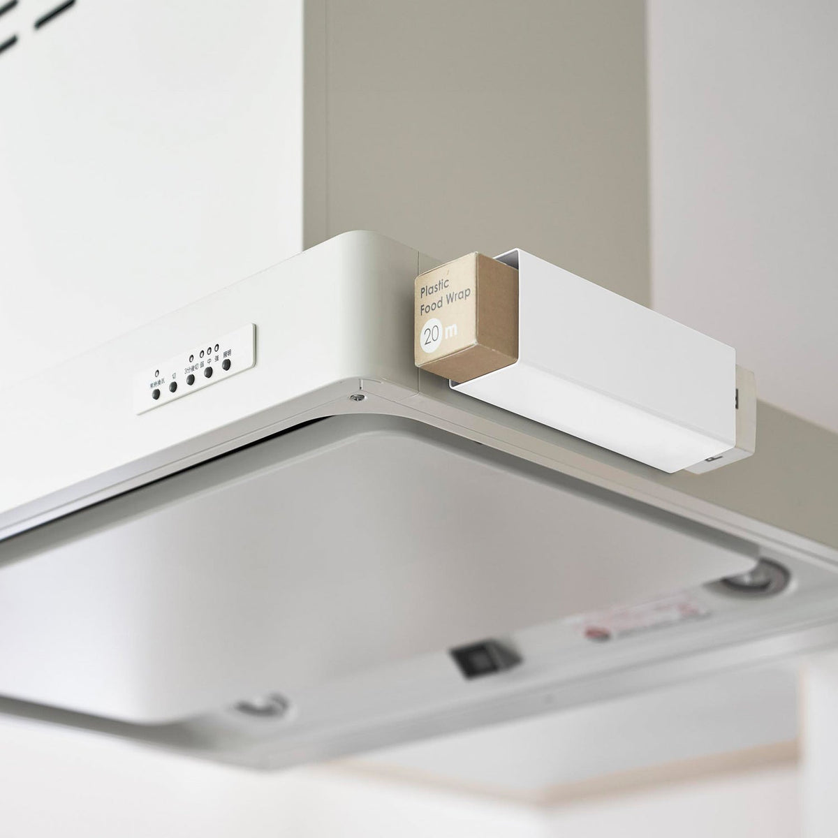 Yamazaki Tower Magnetic Plastic Wrap Holder for Induction Range Hoods, Open-Ended Holder That Sticks to a Range Hood or Steel Panel by Magnet for Wrap Rolls of Any Length, Induction Cooktops Only, 6 x 20 x 6.9 cm and 360 g, White or Black