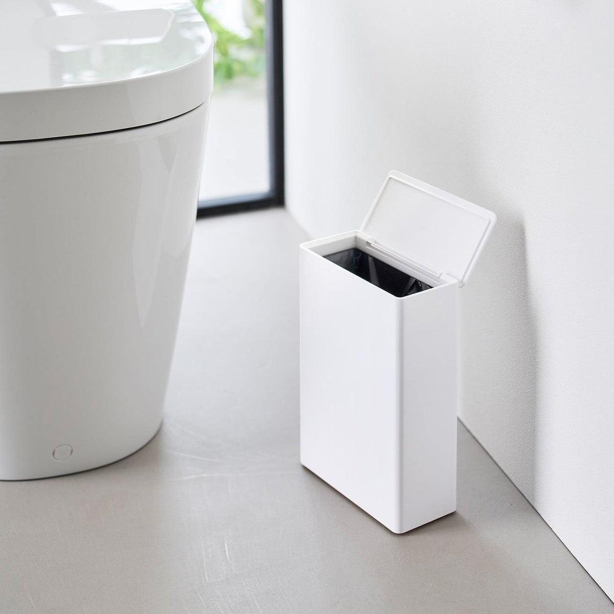 Yamazaki Tower Slim Toilet Waste Bin, Slim Lidded Bathroom Bin 23.8 cm High with a Removable Inner Box of 1.95 L and a Poly Bag Fitting, 16.6 x 8 x 23.8 cm and 450 g, White or Black