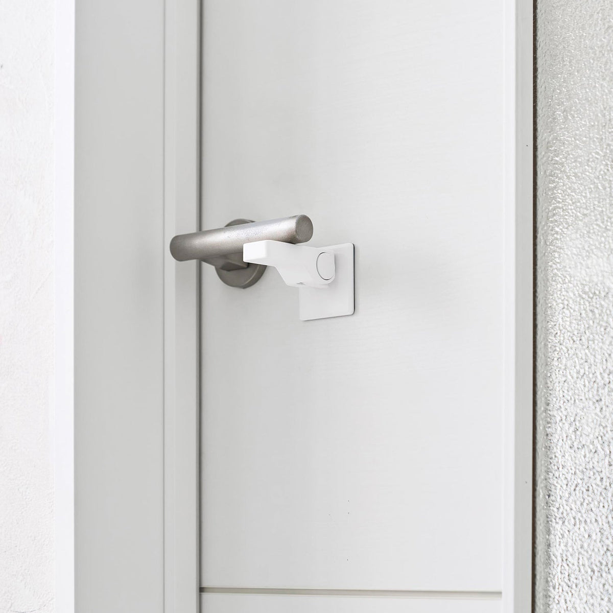 Yamazaki Tower Door Handle Child Lock, Stick-On Child Safety Lock that Covers a Lever Door Handle to Keep Children and Pets from Opening the Door, 5 x 7.5 x 5 cm locked and 30 g, White or Black