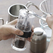 GraSUS Manual Coffee Mill, Manual Coffee Mill With Bean Marks and Ceramic Burrs That Add No Metal Taste, Adjusts From Fine to Coarse, Handle Detaches for Carrying Outdoors, Made in Japan, 13.5 x 6 x 17.5 cm and 260 g, Clear