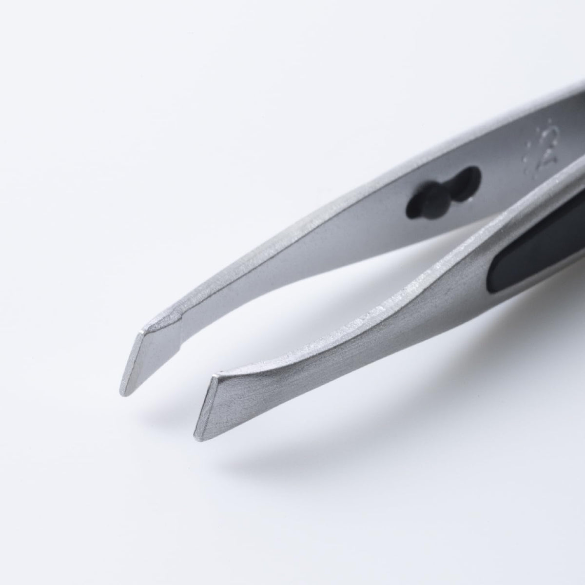 KAI Slant-Tip Eyebrow Tweezers HK0425, Stainless Steel Tweezers with Soft Non-Slip Grip Pads, Silver