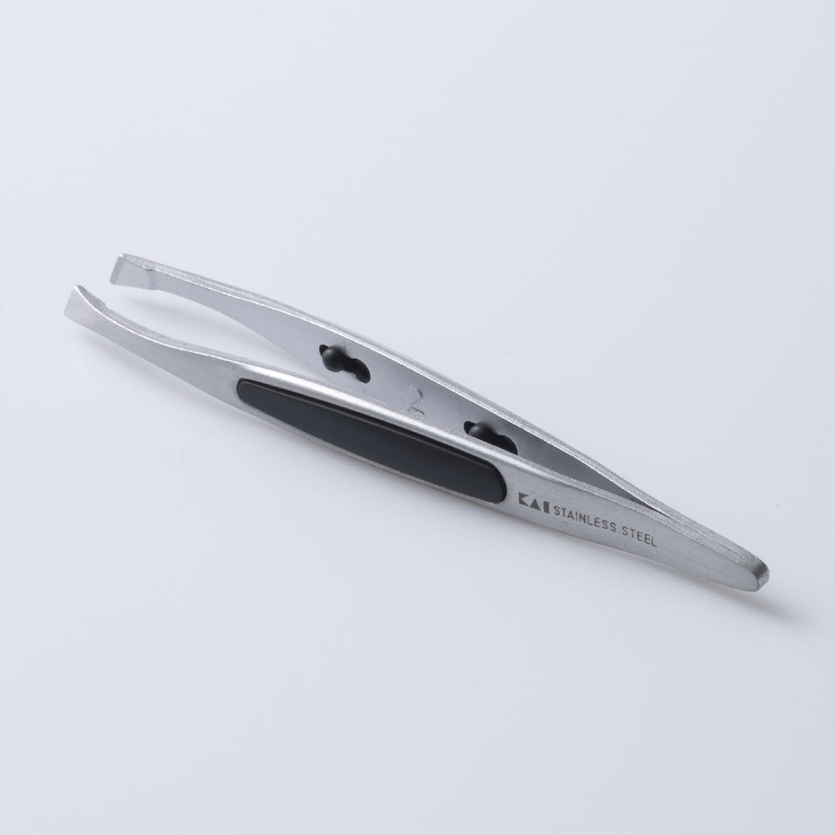 KAI Slant-Tip Eyebrow Tweezers HK0425, Stainless Steel Tweezers with Soft Non-Slip Grip Pads, Silver