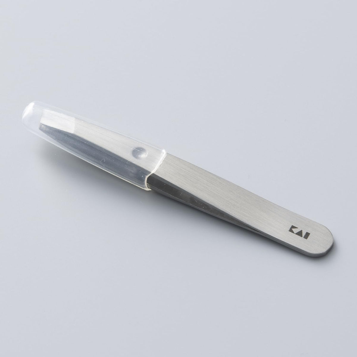 KAI Mini Maru Tweezers KQ2203, Compact Slant-Tip Tweezers with Tip Cap and Tip-Opening Stopper for Fine Hair