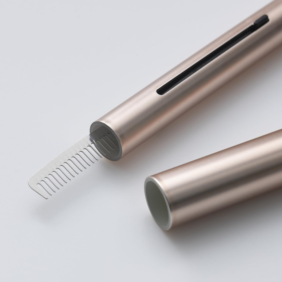 KAI Mini Maru Mascara Comb KQ2212, Slide-Cap Portable Metal Lash Comb for Separating Lashes and Removing Clumps