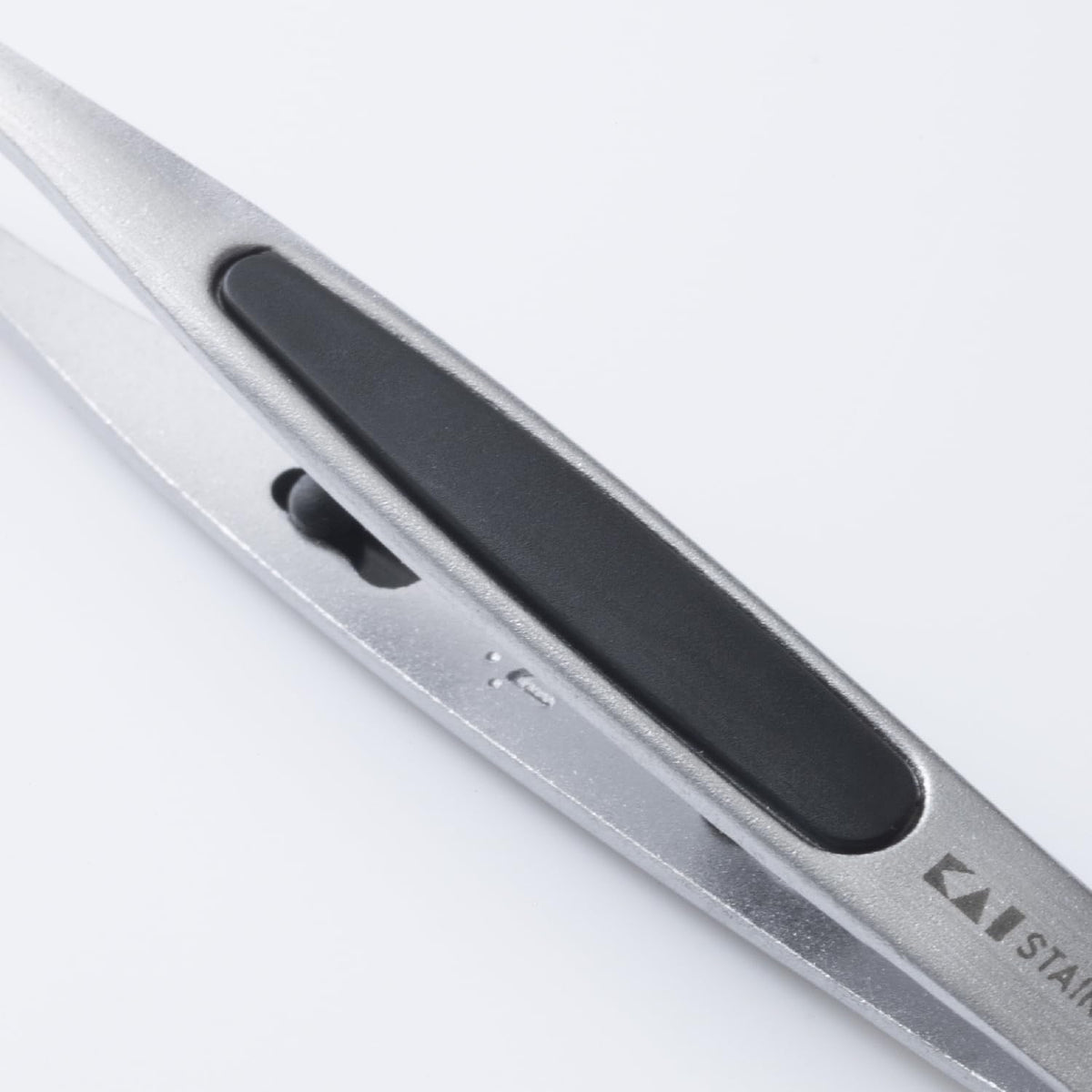 KAI Slant-Tip Eyebrow Tweezers HK0425, Stainless Steel Tweezers with Soft Non-Slip Grip Pads, Silver