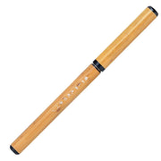 Akashiya Natural Bamboo Brush Pen resting inside a traditional Paulownia wood gift box