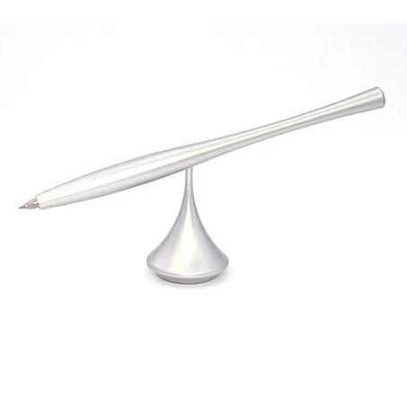 Delight Labo Chrome metal floating ballpoint pen levitating vertically on a matching magnetic circular stand