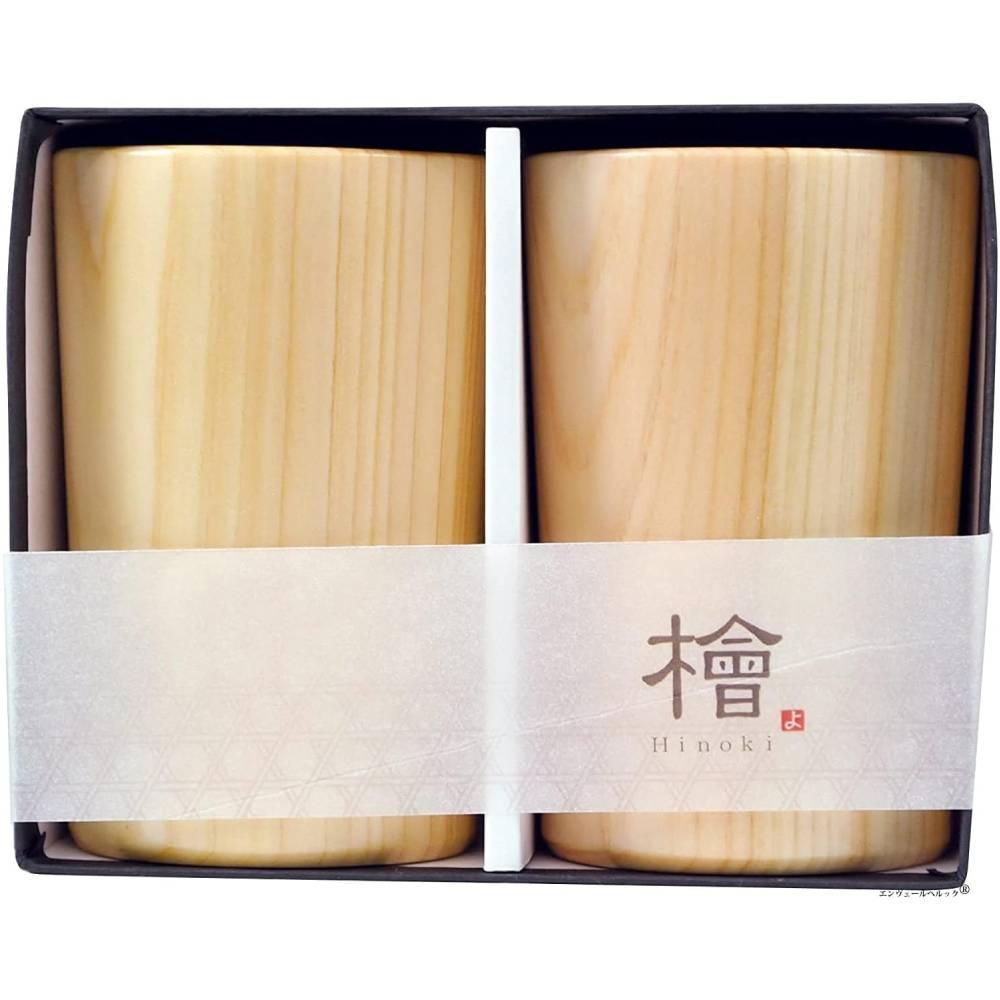 Pair of handcrafted light-colored Hinoki cypress wooden beer cups showing natural wood grain