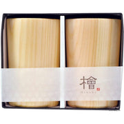 Pair of handcrafted light-colored Hinoki cypress wooden beer cups showing natural wood grain