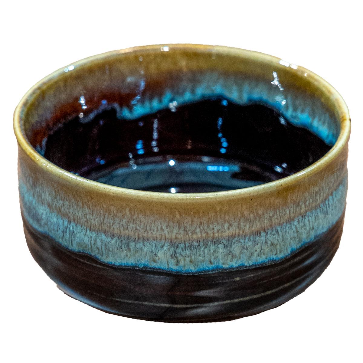 Minimalist Hasami Porcelain Matchawan tea bowl in matte black and brown texture
