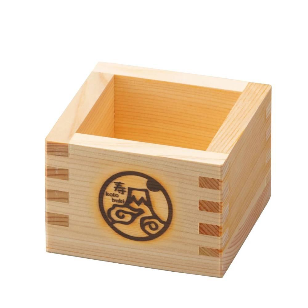 Square wooden Hinoki Masu sake cup made of Japanese cypress featuring a detailed engraving of Mount Fuji
