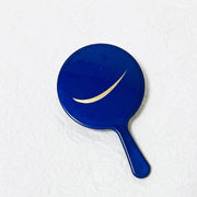 Indigo blue lacquered hand mirror with a gold crescent moon design by Yamada Heiando