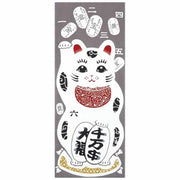 Kenema Hand-Dyed Maneki Neko Tenugui featuring a colorful beckoning cat design on white cotton fabric