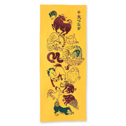 Kenema Hand-Dyed Tenugui featuring the 12 Japanese zodiac animals in vibrant colors on a high-quality white cotton fabric.