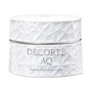 Kose DECORTE AQ Absolute Brightening Cream jar and product texture swatch, showcasing its luxurious appearance and creamy consistency.