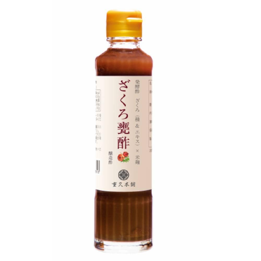 Marushige Aged Concentrated Pomegranate Vinegar 185ml bottle with elegant branding and dark red liquid
