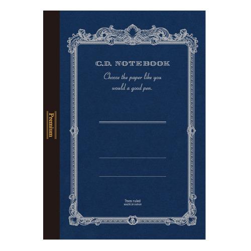 Apica Premium C.D. Notebook A5 size with black cover and silver embossed logo on a desk