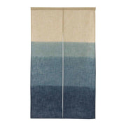 Hand-printed blue indigo Japanese noren curtain made of natural linen hanging in a doorway