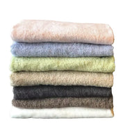 Onaru Premium Imabari Cotton Bath Towel in white, folded neatly to show the plush texture and 68x125cm dimensions